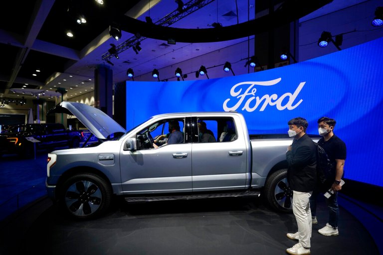 The Ford F-150 Lightning EV is shown at the AutoMobility LA Auto Show Thursday, Nov. 18, 2021, in Los Angeles. 