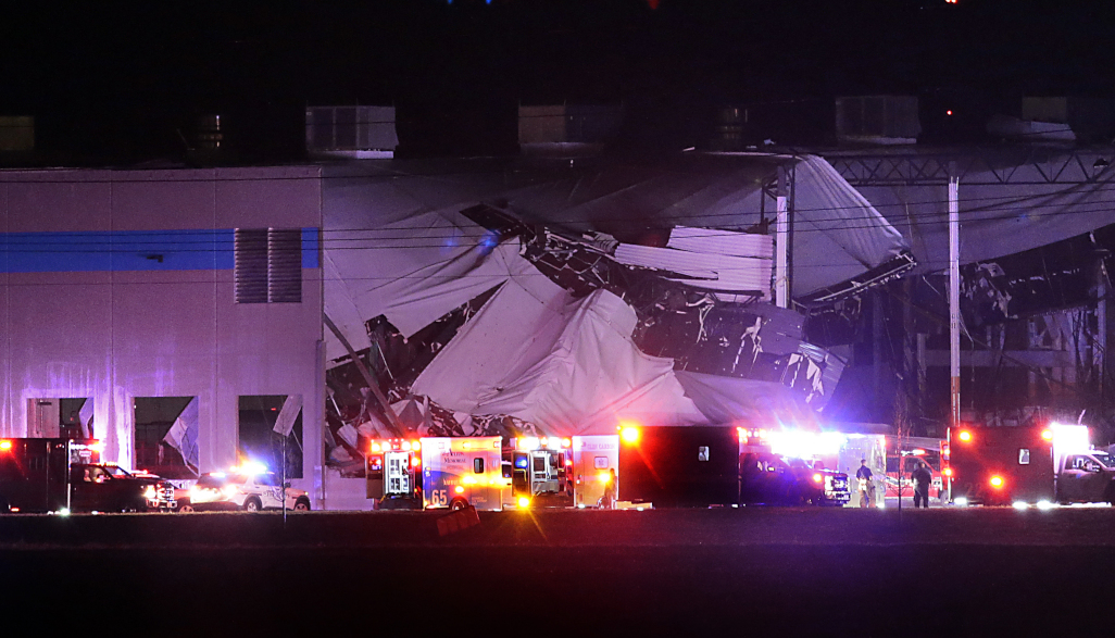 The Amazon distribution center is partially collapsed after being hit by a tornado Friday in Edwardsville, Ill.  