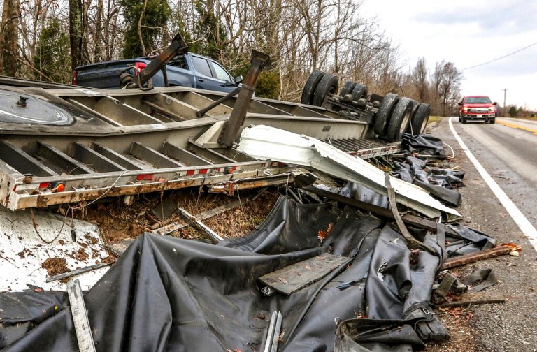 Train derailed by tornado in Kentucky, homes left damaged
