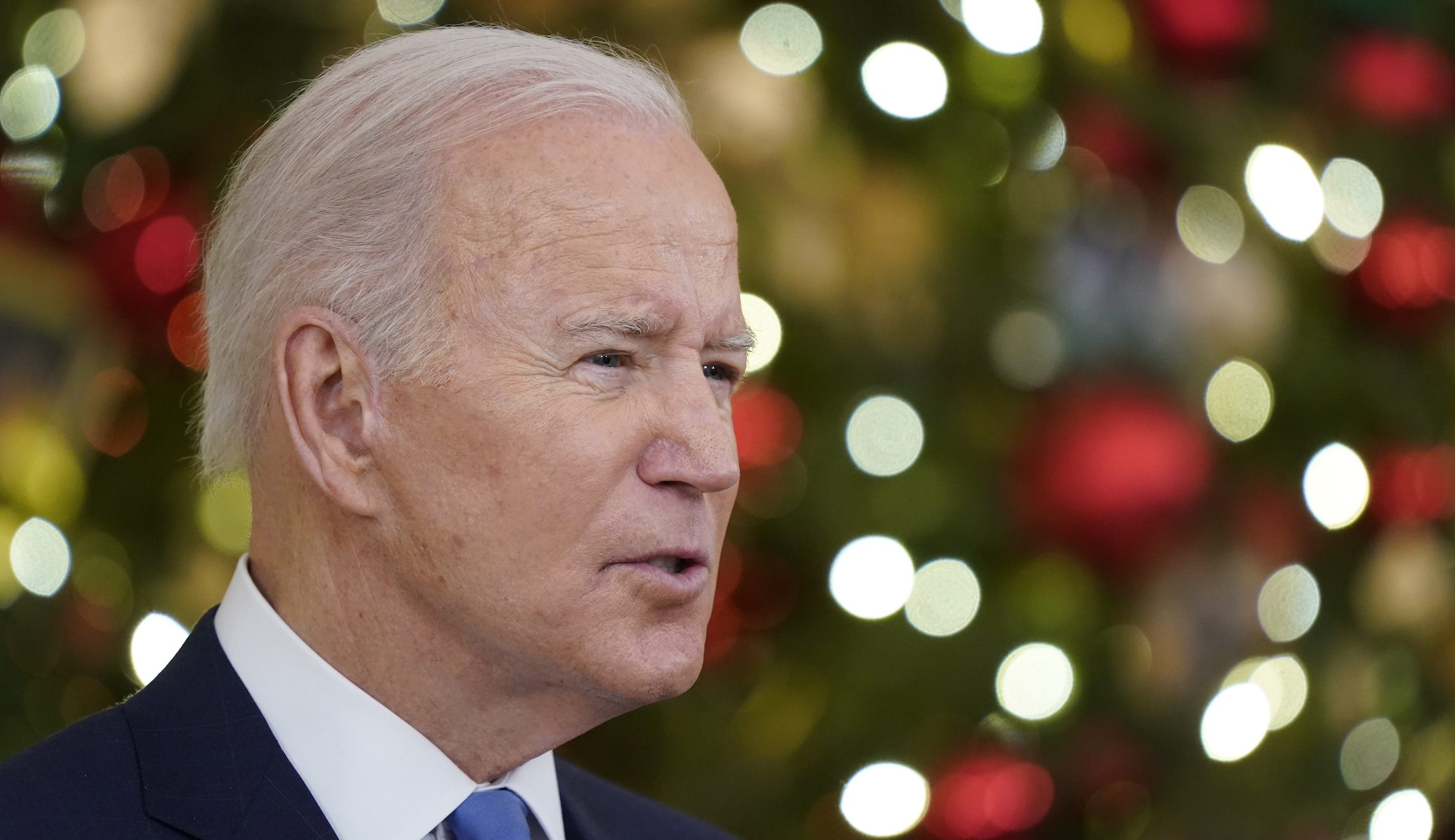 Biden touts supply chain progress and stalled spending bill days before Christmas