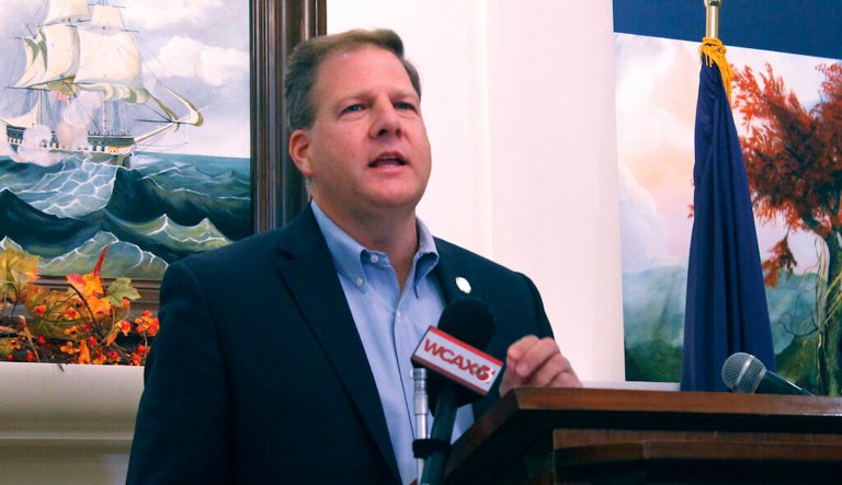 Republican Gov. Chris Sununu announces that he is seeking a fourth term as governor of New Hampshire, instead of running for the U.S. Senate seat held by Democratic Sen. Maggie Hassan, during a news conference, Tuesday, Nov. 9, 2021, in Concord, N.H. 
