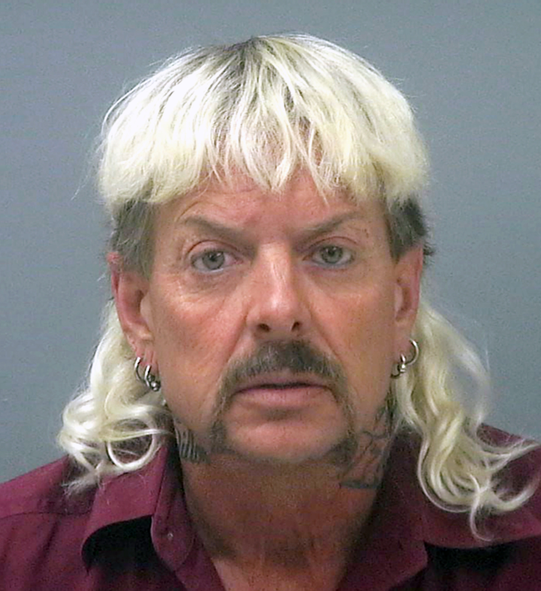 Tiger King’s Joe Exotic resentenced to 21 years in prison