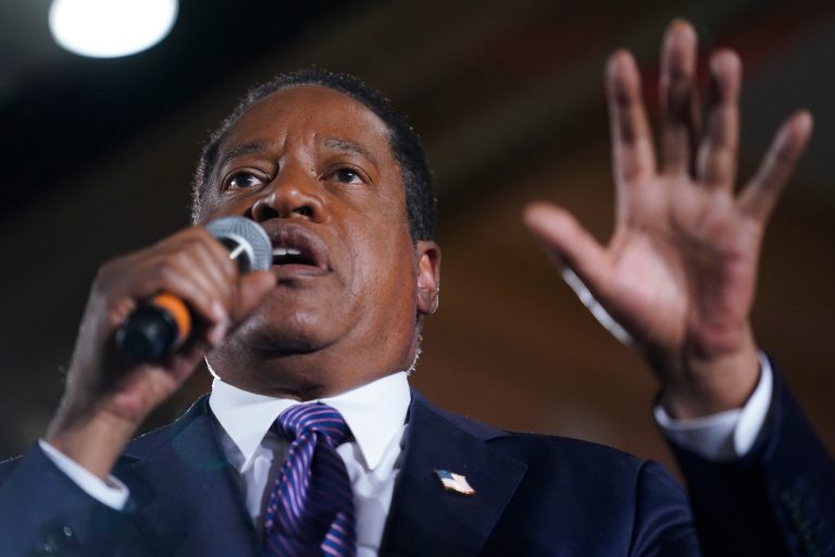 FILE - Larry Elder speaks to supporters (AP Photo/Ashley Landis, File)