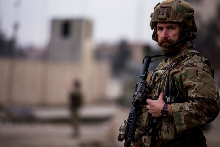 A U.S. soldier stands guard in Hassakeh, northeast Syria.