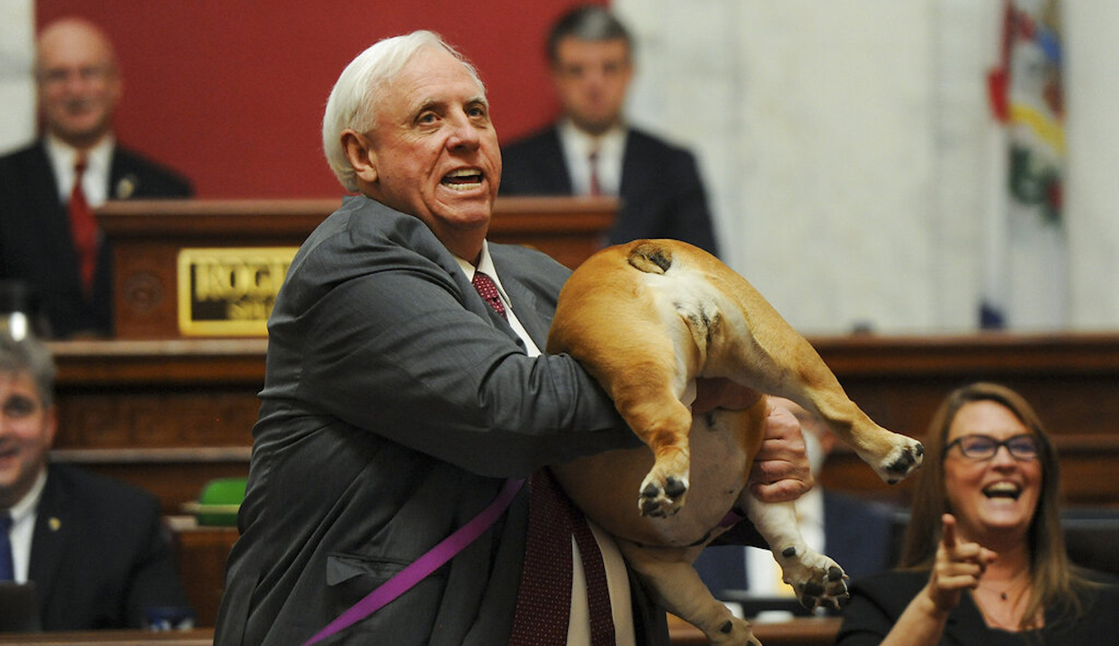 West Virginia governor tells Bette Midler to kiss his dog’s ‘hiney’