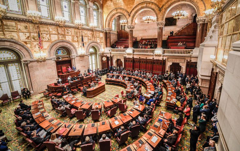 The New York state Senate meets in the Senate Chamber on the opening day of the legislative session at the state Capitol in Albany, N.Y., on Jan. 8, 2020. New York's legislature has voted to pass new congressional district maps that will expand Democrats' influence in New York politics for years to come. 