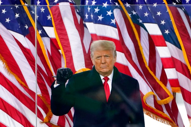 Then-President Donald Trump gestures as he arrives to speak at a rally in Washington, on Jan. 6, 2021.  The social media platform Gab launched in 2016 and now claims to have 15 million monthly visitors, though that number could not be independently verified. The service says it saw a huge jump in signups following the January 6 riot, which prompted Facebook, Twitter and YouTube to crack down on Trump and others who they said had incited violence. 