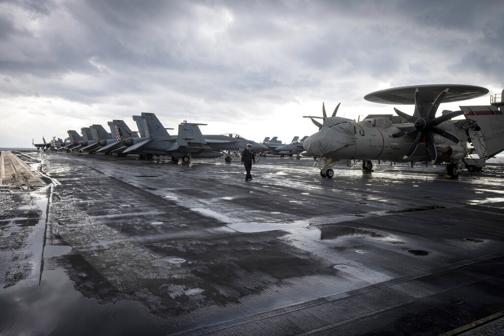 Fighter jet blows off USS Truman during bad weather