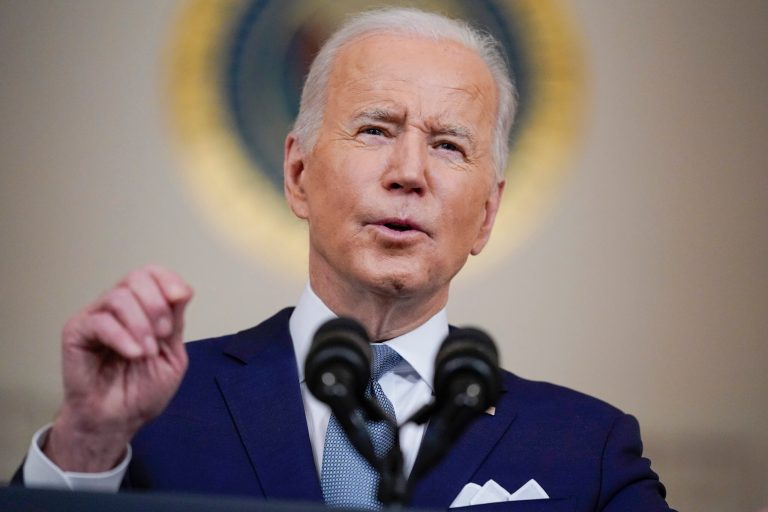 Biden condemns Putin and swipes at Trump in State of the Union address