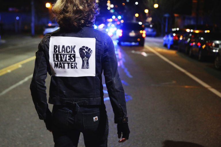 Several thousand protesters make their way through Capitol Hill and the Central District, demonstrating against racial inequality, President Donald Trump and the city-planned youth jail, Saturday, March 4, 2017. The march was led by members of the Black Lives Matter movement.