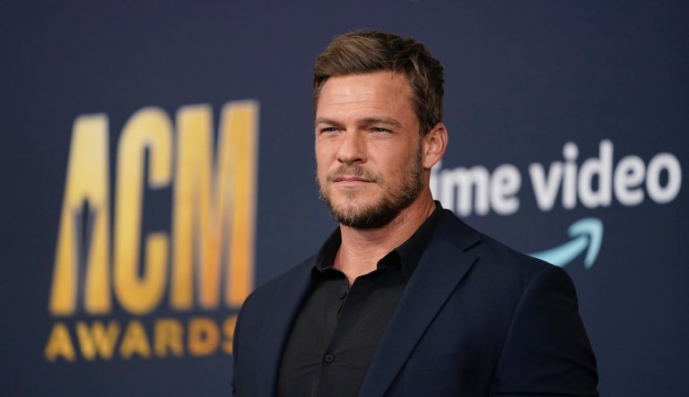 Alan Ritchson arrives at the 57th Academy of Country Music Awards on Monday, March 7, 2022, at Allegiant Stadium in Las Vegas.