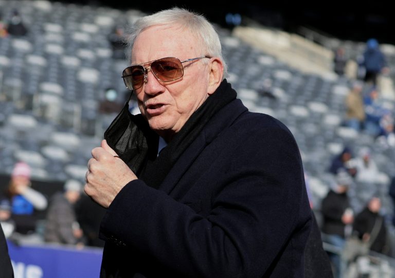 FILE - Dallas Cowboys owner Jerry Jones walks on the field before an NFL football game between the New York Giants and the Cowboys on Dec. 19, 2021, in East Rutherford, N.J.