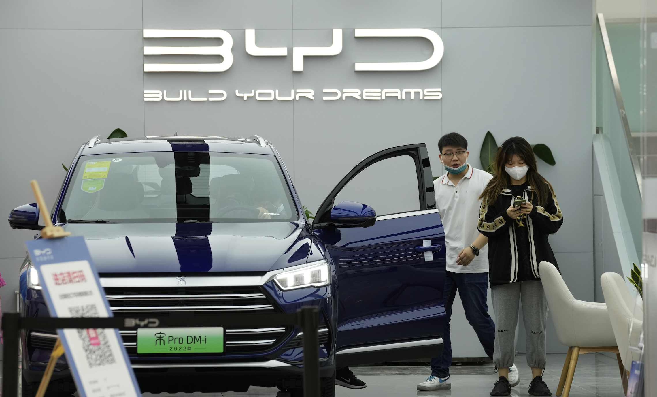 Tesla overtaken as world’s largest electric vehicle maker by Chinese company