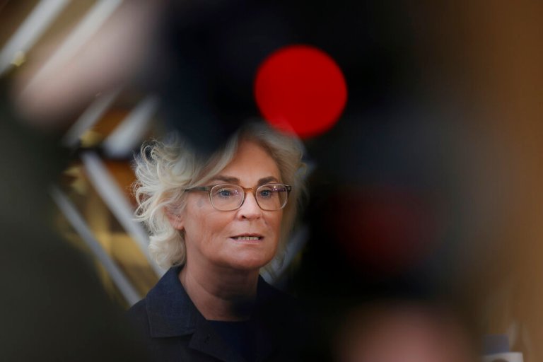 German defense minister Christine Lambrecht talks to the press prior to the EU foreign and defense ministers council at the Europa building in Brussels, Monday, March 21, 2022. 