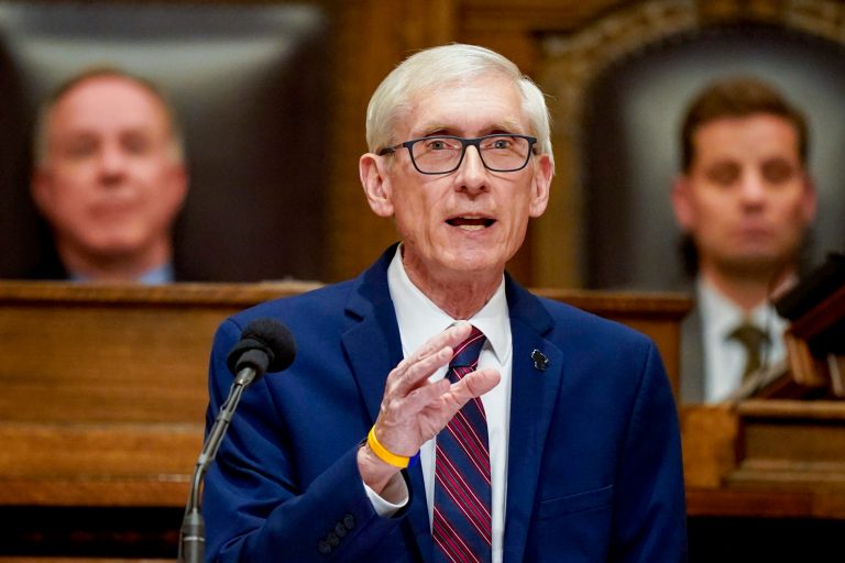 FILE - Wisconsin Gov. Tony Evers addresses a joint session of the Legislature in the Assembly chambers during the governor's State of the State speech at the state Capitol.
