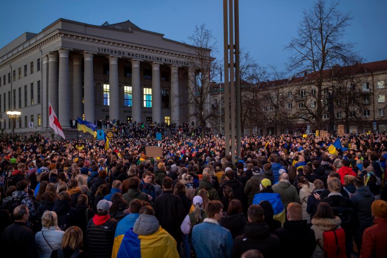 People take part in a protest against the Russian invasion of Ukraine at Independence Square at the Parliament Palace in Vilnius, Lithuania, Thursday, March 24, 2022. 