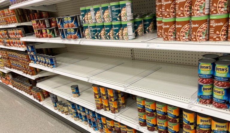 Racks sit devoid of product in a Target store on March 15, 2022, in Sheridan, Colorado.