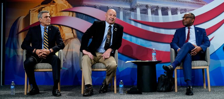Lou Barletta, left, Pennsylvania state Sen. Doug Mastriano, R-Franklin, and Nche Zama take part in a forum for Republican candidates for governor of Pennsylvania at the Pennsylvania Leadership Conference in Camp Hill, Pennsylvania, Friday, April 1, 2022.