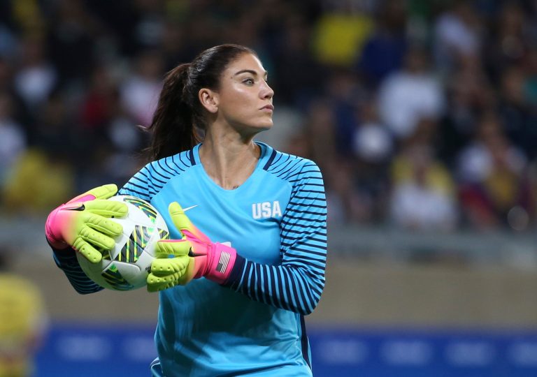 FILE - U.S. goalkeeper Hope Solo takes the ball during a women's soccer game at the Rio Olympics.