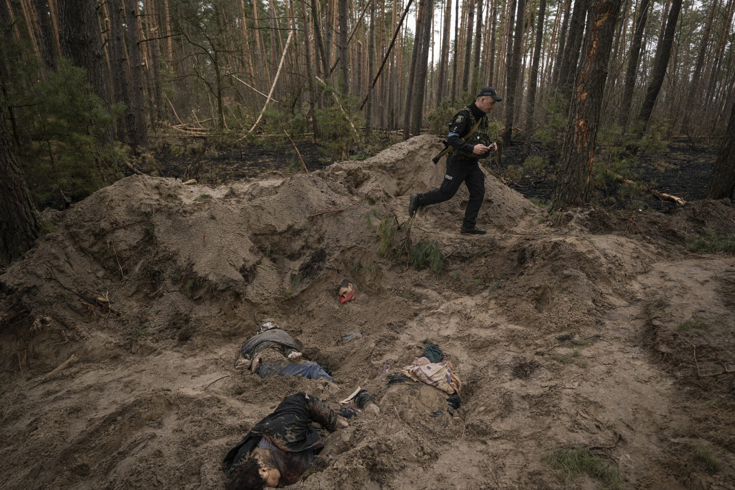 Ukrainian mayor found tortured and executed beside family in shallow grave