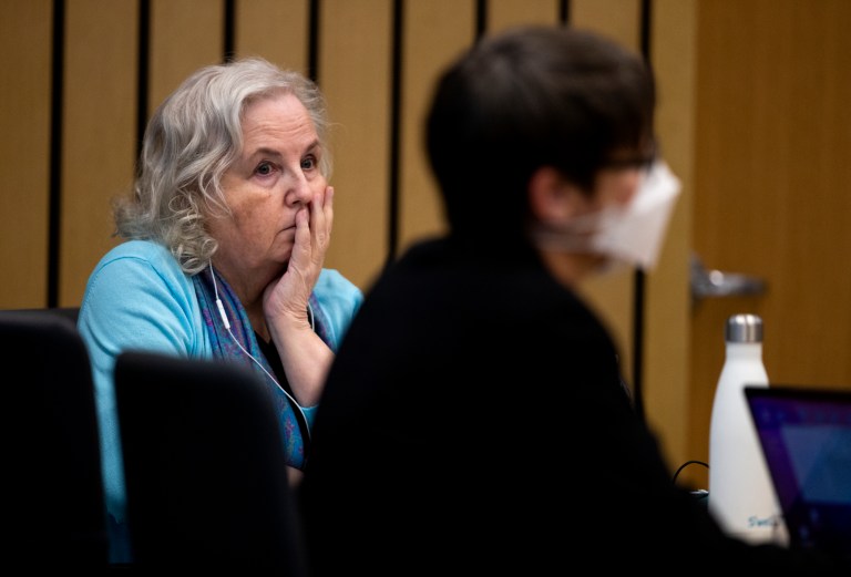 Nancy Crampton Brophy, left, accused of killing her husband Dan Brophy in June of 2018, is seen in court during her trial in Portland, Ore., Tuesday, April 5, 2022. The trial of the self-published romance writer accused of fatally shooting her chef husband started Monday. She has remained in custody since her arrest in September 2018, facing a murder charge in the death of Daniel Brophy, 63, The Oregonian/OregonLive reported. The trial is expected to last seven weeks. (Dave Killen/The Oregonian via AP, Pool)