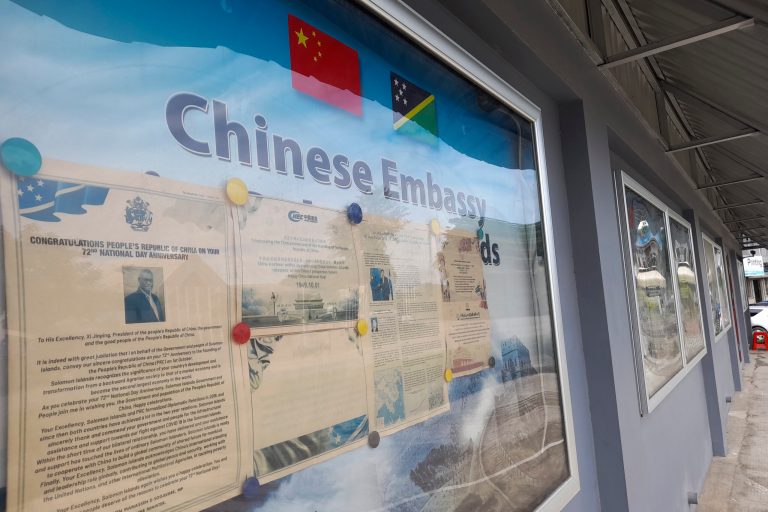 A display case of photos is seen outside the Chinese Embassy in Honiara, Solomon Islands.
