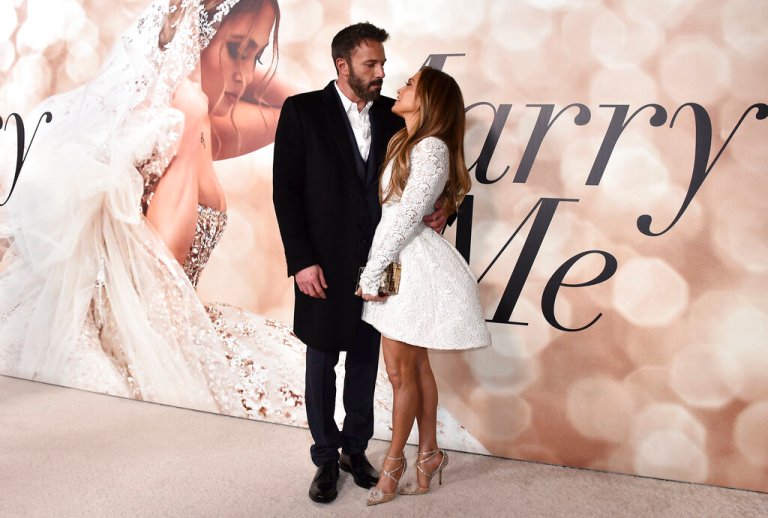Cast member Jennifer Lopez, right, and Ben Affleck attend a photo call for a special screening of "Marry Me" at DGA Theater on Tuesday, Feb. 8, 2022, in Los Angeles.