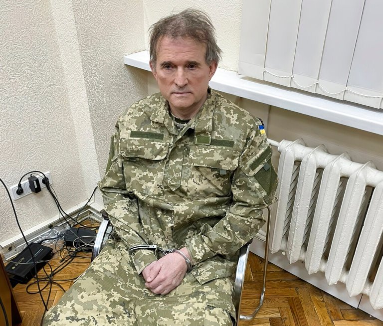 Oligarch Viktor Medvedchuk sits handcuffed after being detained in a special operation carried out by the Ukraine's secret service, Tuesday, April 12, 2022.