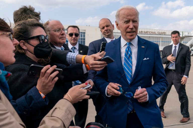 President Joe Biden speaks to the media before boarding Air Force One at Des Moines International Airport, in Des Moines, Iowa, Tuesday, April 12, 2022, en route to Washington. Biden said that Russia's war in Ukraine amounted to a 