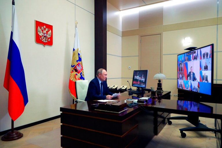 Russian President Vladimir Putin chairs a Security Council meeting via videoconference at the Novo-Ogaryovo residence outside Moscow, Russia, Friday, April 15, 2022. 