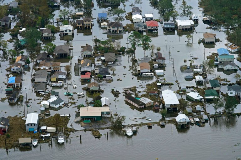 Floodwaters slowly recede in the aftermath of Hurricane Ida in Lafitte, La., about 25 miles south of New Orleans, Wednesday, Sept. 1, 2021. The World Meteorological Organization is set to retire Ida from the hurricane list.