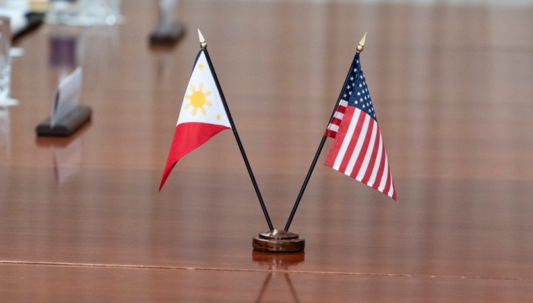 Flags are in place on the table for a meeting with Secretary of Defense Lloyd Austin and Philippines Secretary of National Defense Delfin Lorenzana at the Pentagon, Monday, April 18, 2022, in Washington. 