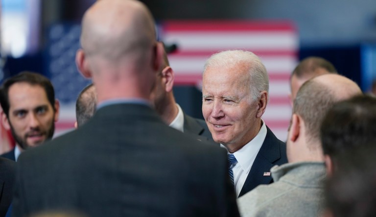 President Joe Biden talks to people in the crowd after speaking about his infrastructure agenda at the New Hampshire Port Authority in Portsmouth, N.H., Tuesday, April 19, 2022.                                                                                                                            