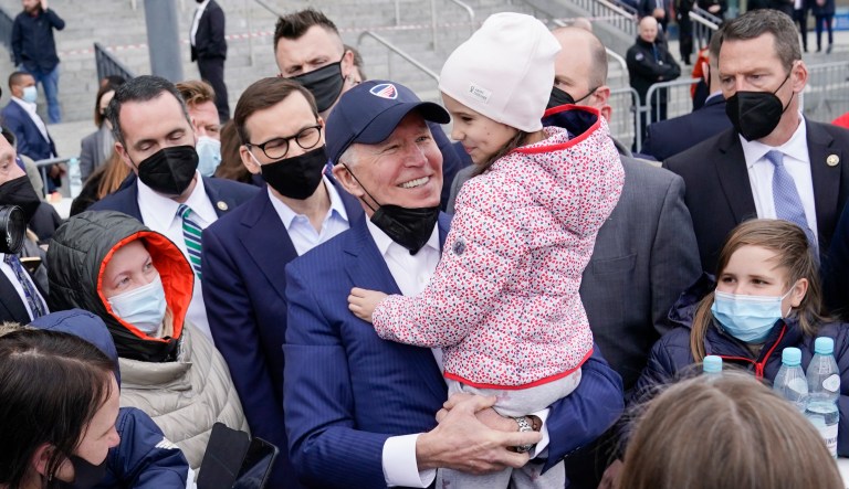 President Joe Biden meets with Ukrainian refugees during a visit to PGE Narodowy Stadium, Saturday, March 26, 2022, in Warsaw.