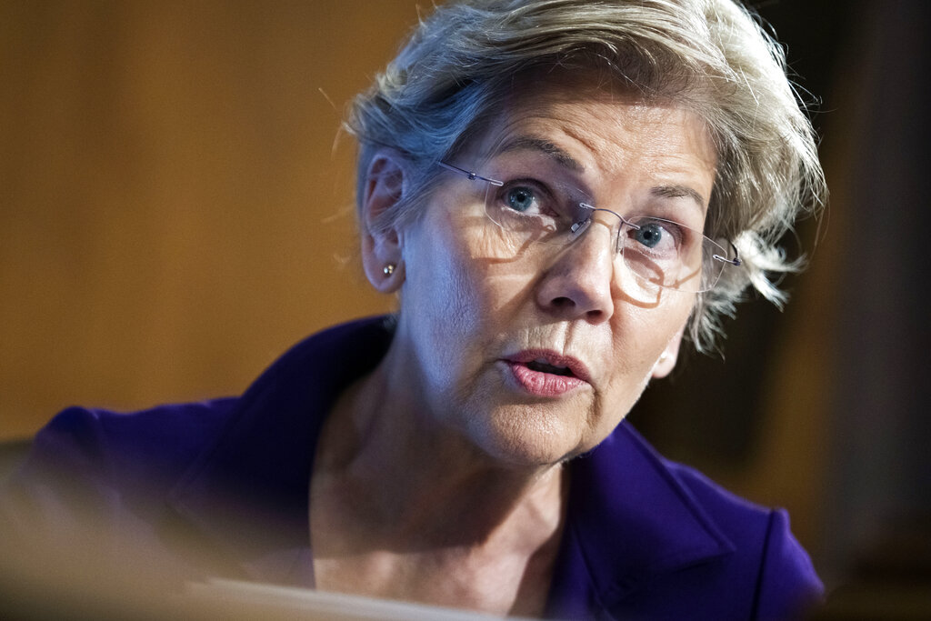 Warren attacks Powell for raising odds of ‘devastating recession’