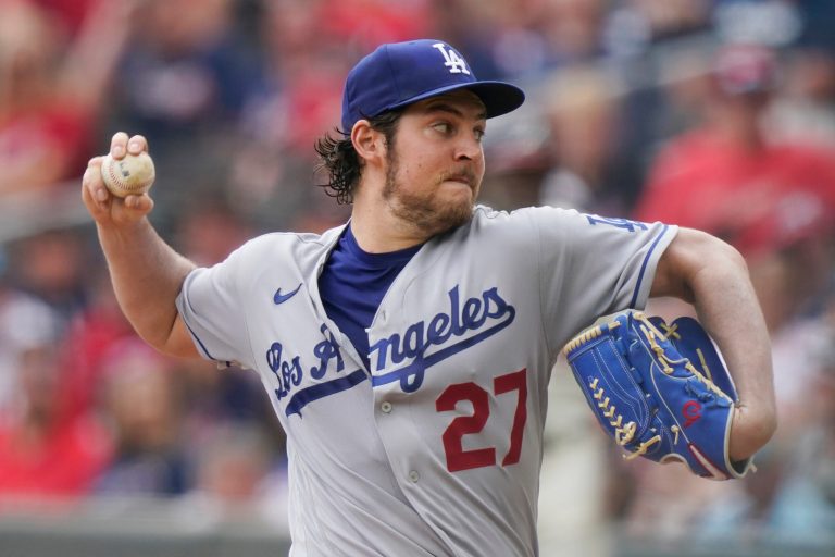 FILE - Los Angeles Dodgers starting pitcher Trevor Bauer delivers in the first inning of a baseball game against the Atlanta Braves, June 6, 2021.