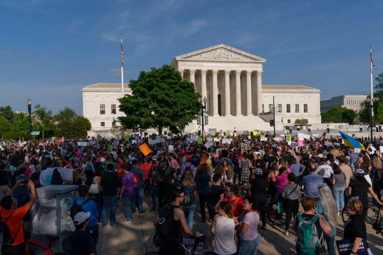 Demonstrators protest outside of the U.S. Supreme Court Tuesday, May 3, 2022 in Washington. 