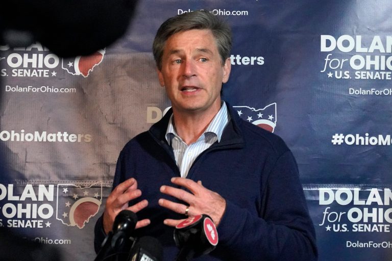 Republican U.S. Senate candidate Matt Dolan talks with reporters after conceding to JD Vance at a watch party in Independence, Ohio on Tuesday, May 3, 2022. 