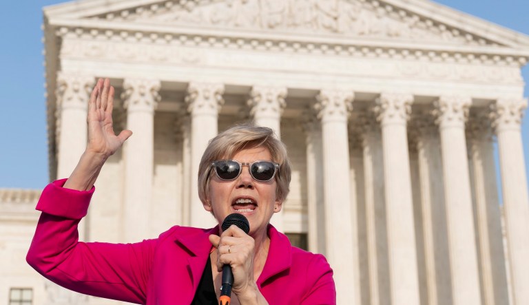 Sen. Elizabeth Warren (D-MA) speaks outside of the Supreme Court on Tuesday, May 3, 2022, in Washington.