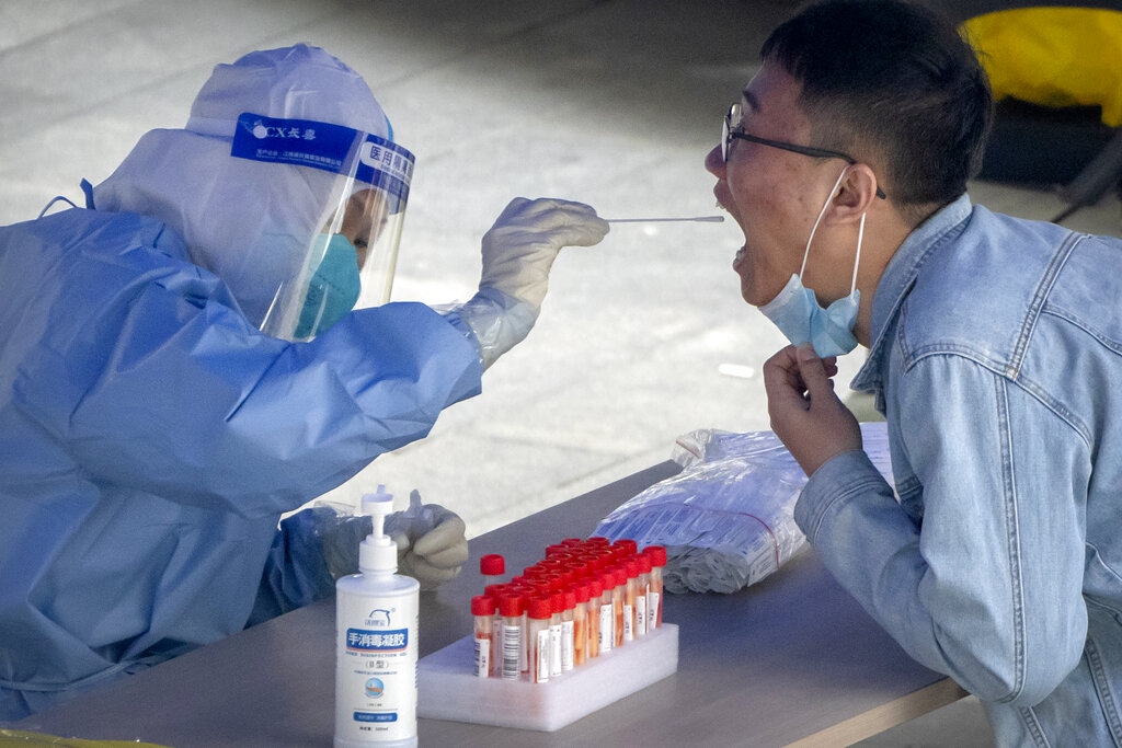 WHO: COVID-19 death toll nearly 15 million, over double previous estimate