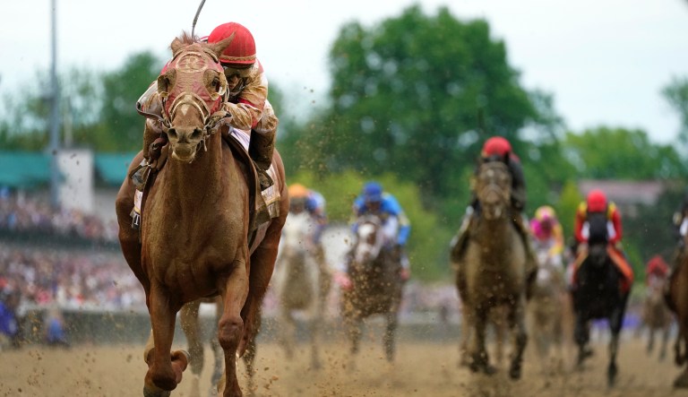 Rich Strike, with Sonny Leon aboard, wins the 148th running of the Kentucky Derby horse race at Churchill Downs Saturday, May 7, 2022, in Louisville, Ky.