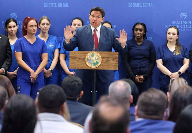 Florida Gov. Ron DeSantis answers questions during a press conference at Seminole State College in Sanford on May 16, 2022. DeSantis announced $125 million in funding for nursing education. 