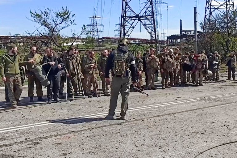 Russia claims over 900 Ukrainian troops surrender from Azovstal, commanders refuse