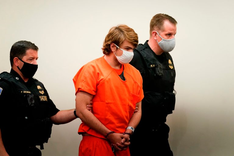 Payton Gendron is led into the courtroom for a hearing at Erie County Court, in Buffalo, N.Y., Thursday, May 19, 2022. He was charged federally in a 26-count criminal complaint on Wednesday, June 15, 2022. 