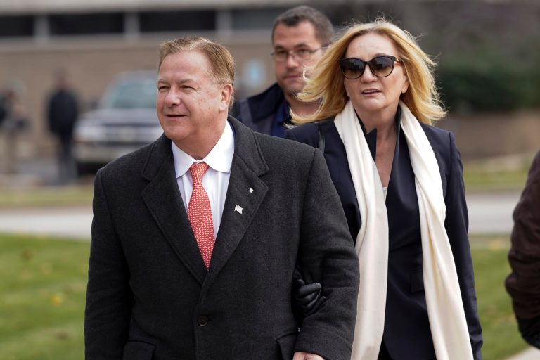 FILE - In this Nov. 16, 2021, file photo, Mark McCloskey, a Republican candidate for U.S. Senate in Missouri, and his wife, Patricia McCloskey, walk outside the Kenosha County Courthouse, in Kenosha, Wis. McCloskey only gained 3% of the vote in the primary election for Missouri GOP Senate. (AP Photo/Paul Sancya, File)