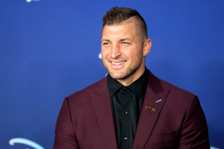 Tim Tebow attends the Disney 2022 Upfront presentation at Basketball City Pier 36 on Tuesday, May 17, 2022, in New York. 