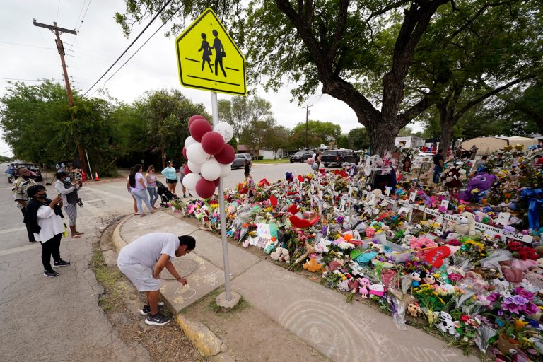 Uvalde teacher remembers shutting propped-open door during shooting, lawyer says