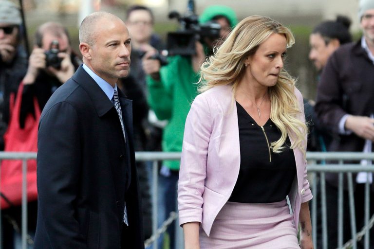 CORRECTS YEAR OF SENTENCING TO 2022, NOT 2020 - FILE - Stormy Daniels and her attorney Michael Avenatti leave federal court in New York, on April 16, 2018.