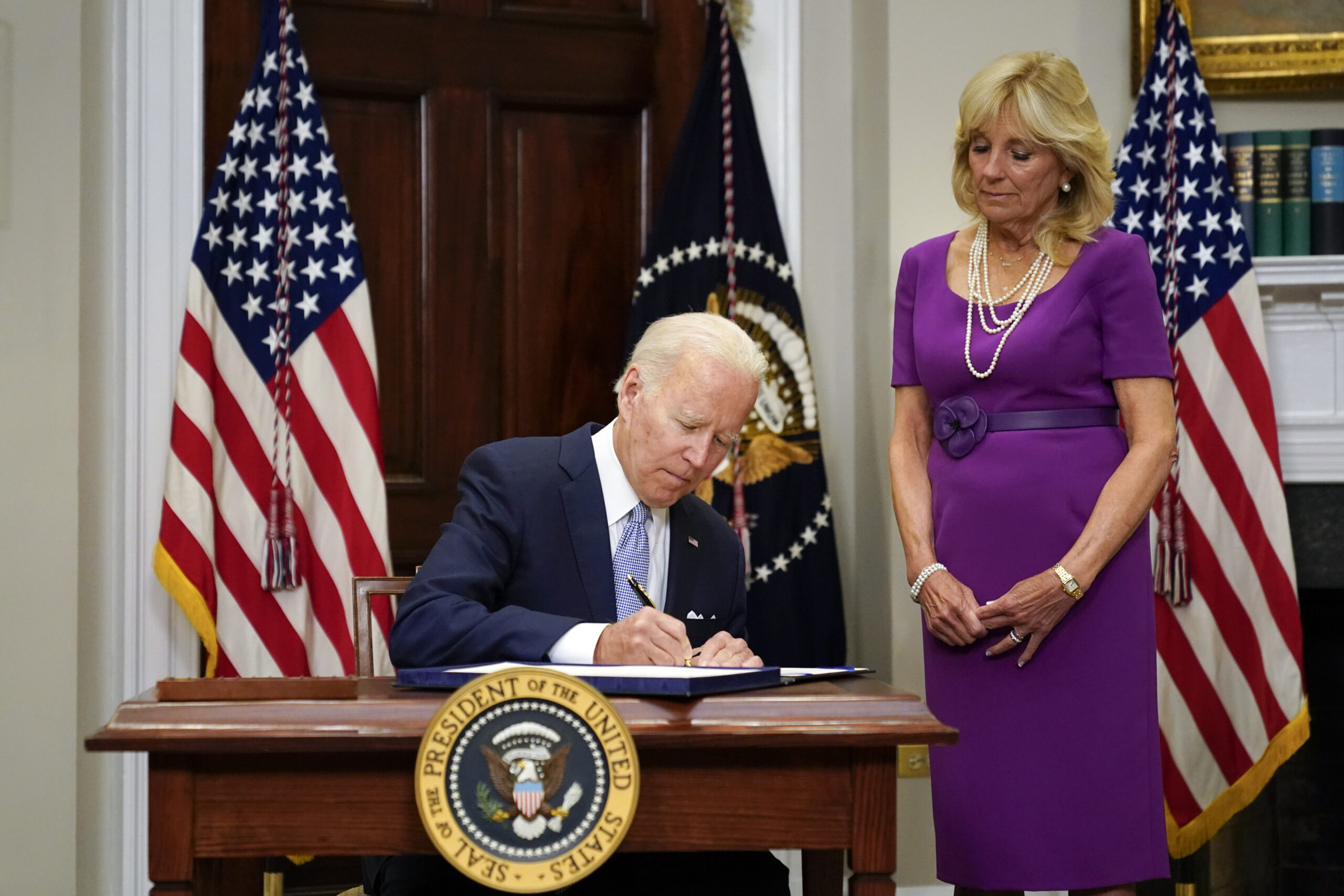Biden hopes to defy midterm election history after signing gun law