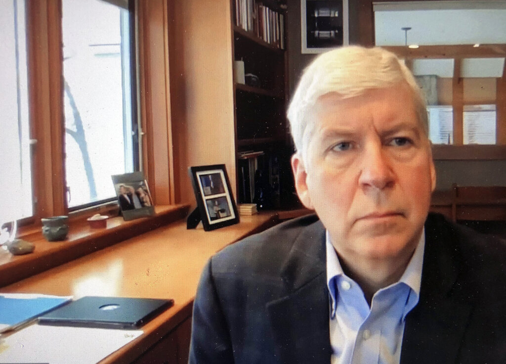 Michigan judge dismisses charges against former GOP governor over Flint water crisis